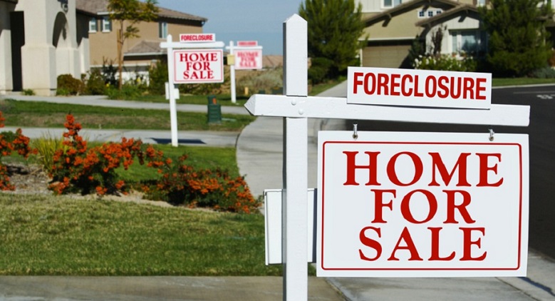 Foreclosure home for sale sign