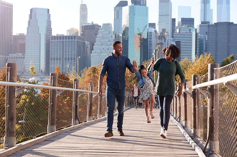 New York family walking after buying real estate